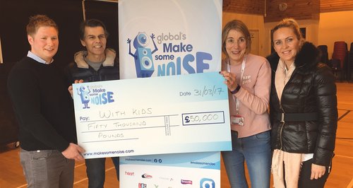 With Kids getting presented with their cheque